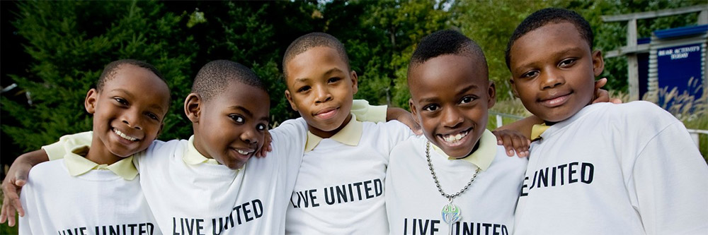 Kids wearing Live United shirts